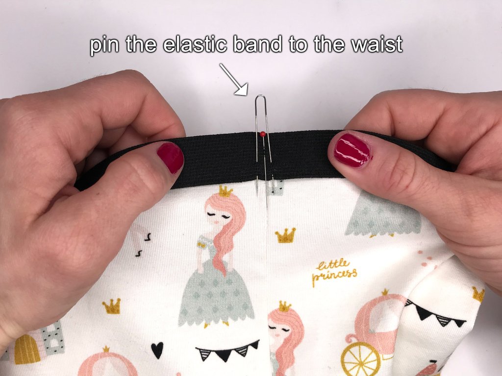 Pinning the waistband with Clover fork pins to leggings.