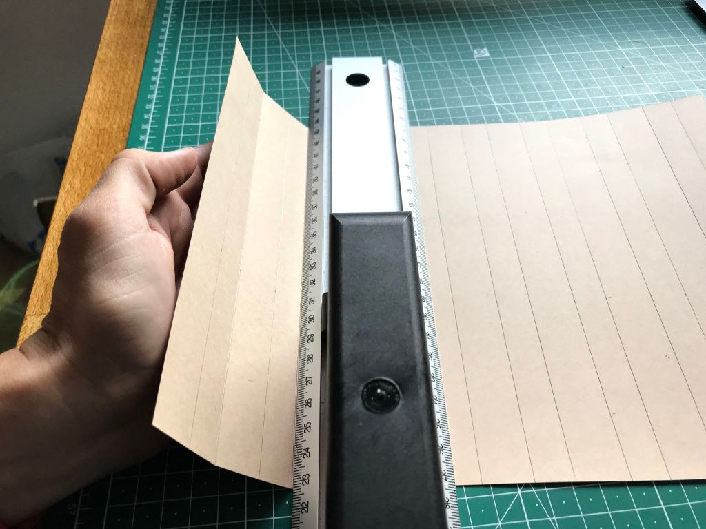 Folding the pre-pressed lines of knife pleating moulds.