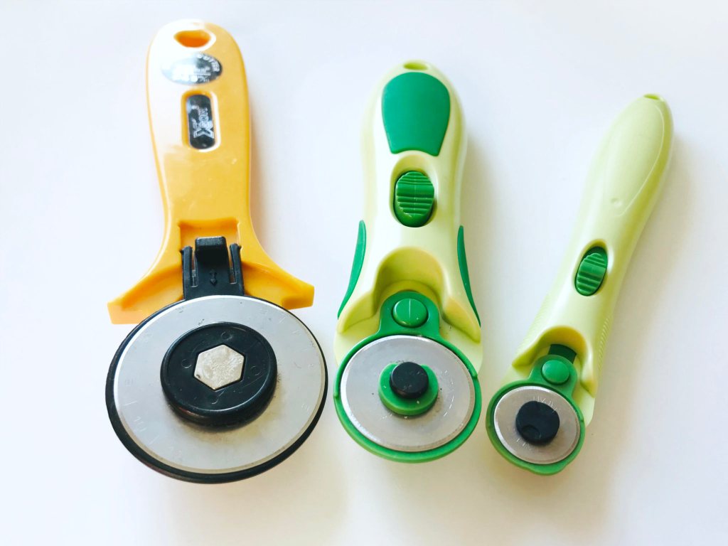 Rotary cutters of various sizes.