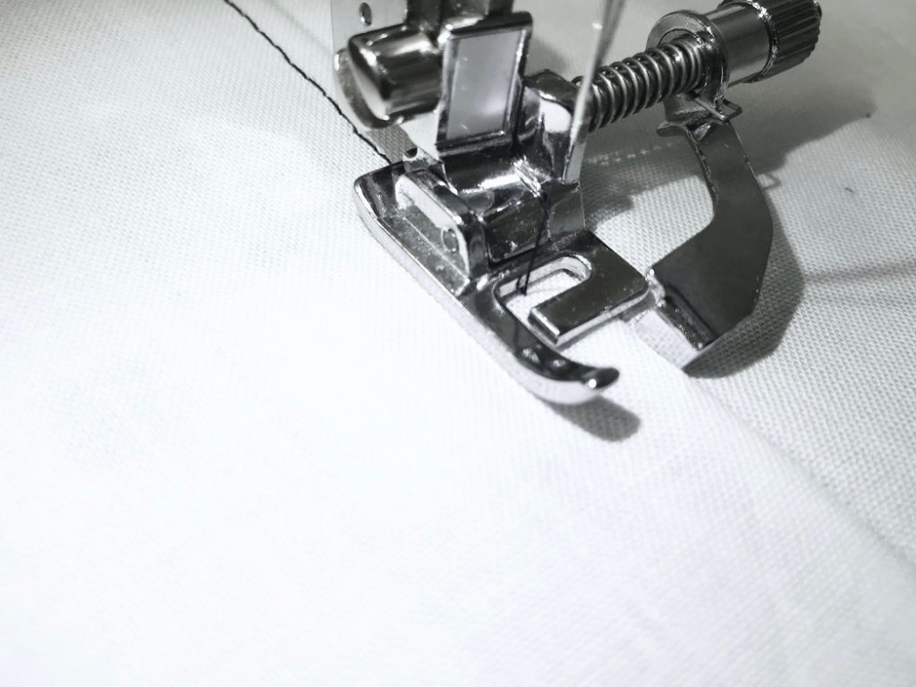Topstitching seams with blind stitch presser foot.