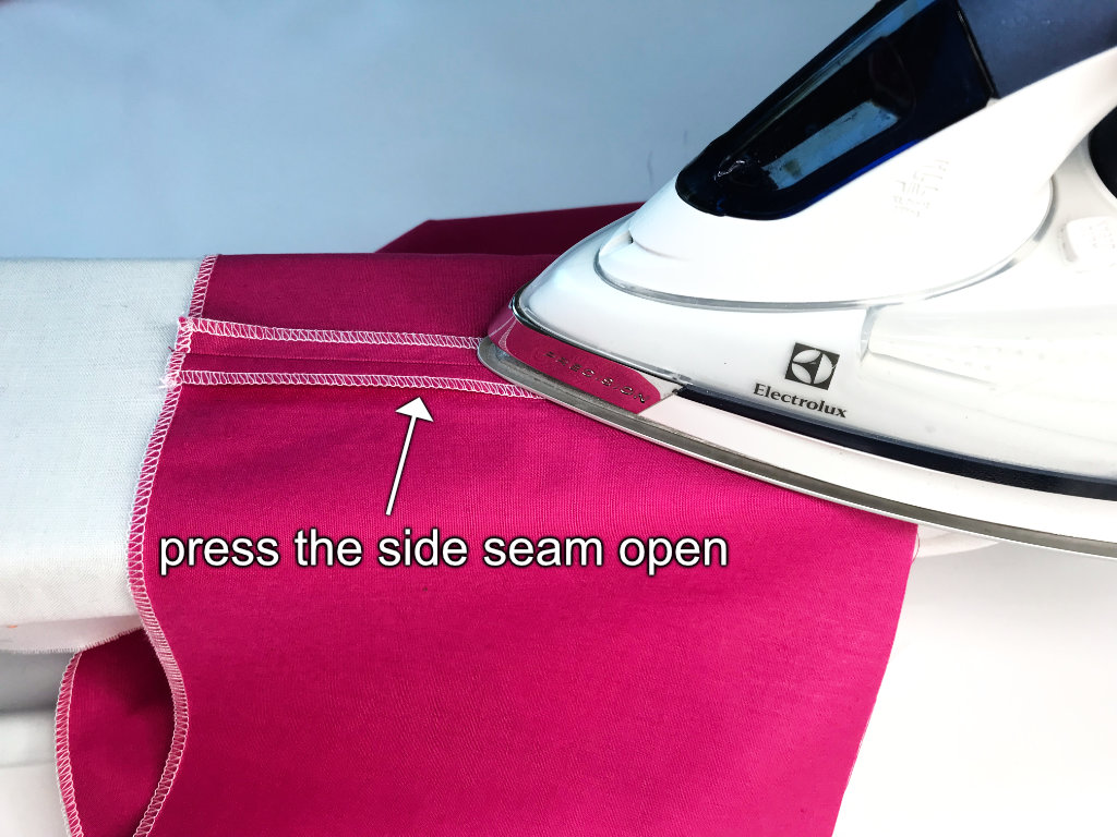Pressing a lining side seam open.