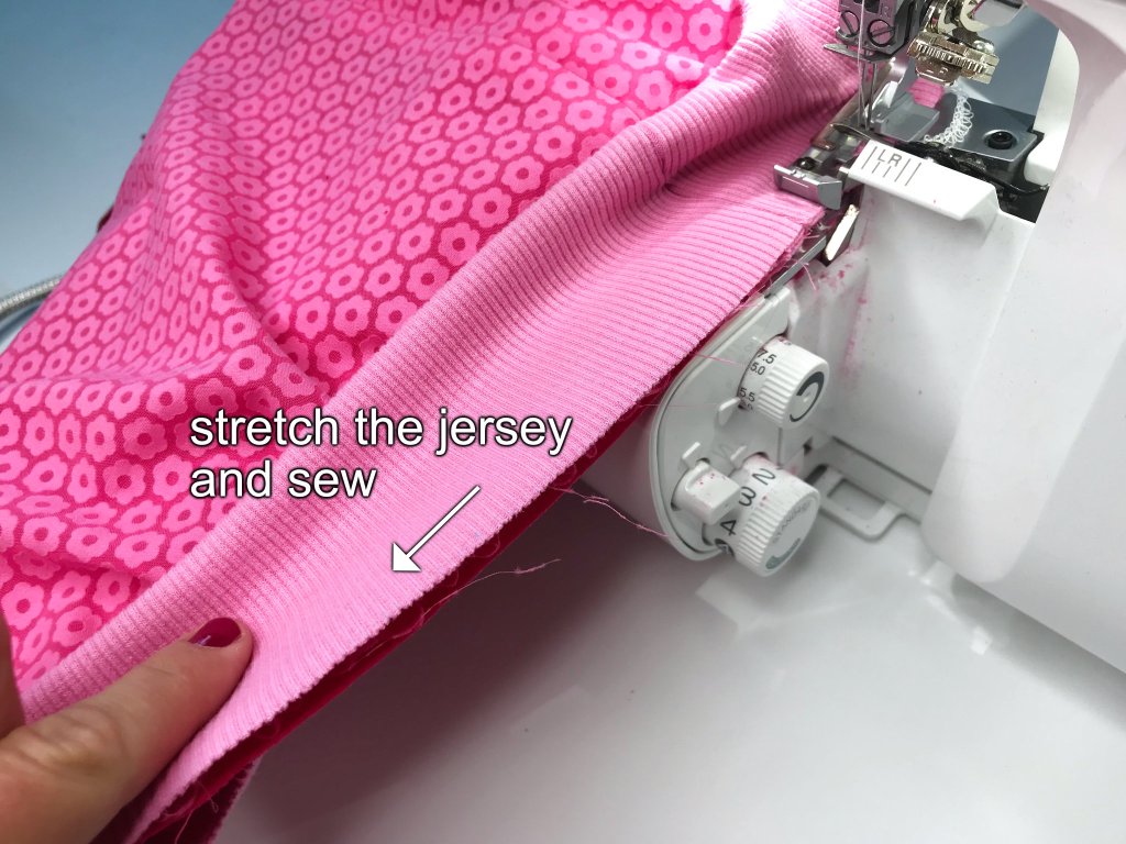 Sewing a rib jersey elastic waistband casing to a ballon skirt waist.
