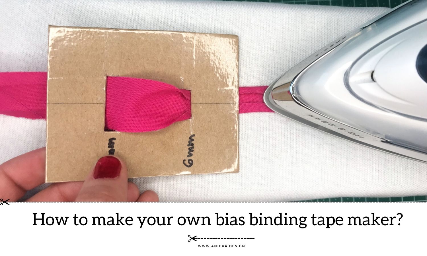 Using a cardboard DIY bias binding tape maker to make a custom binding tape.