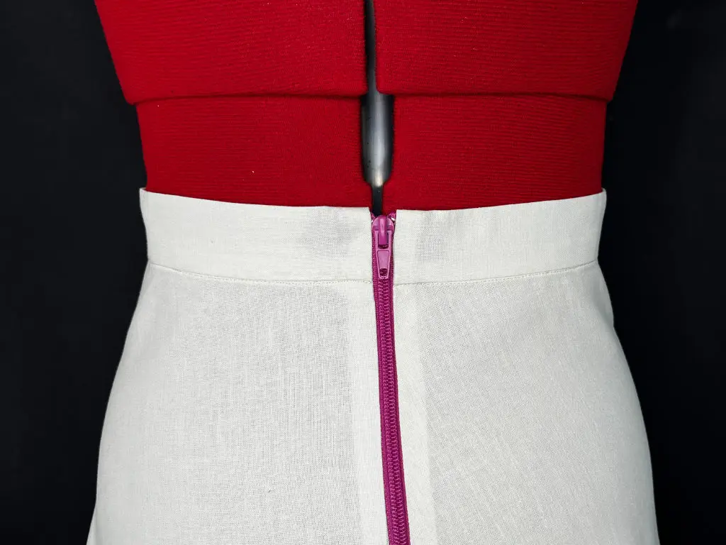 Circle skirt with exposed zipper.