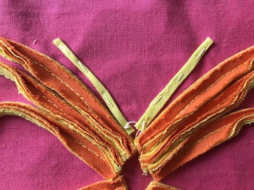 Basted butterfly antennae.