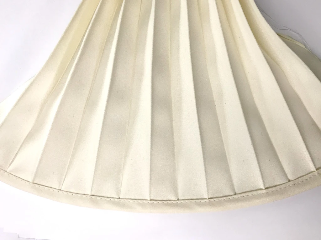 Bias binding tape applied to fabric edge.