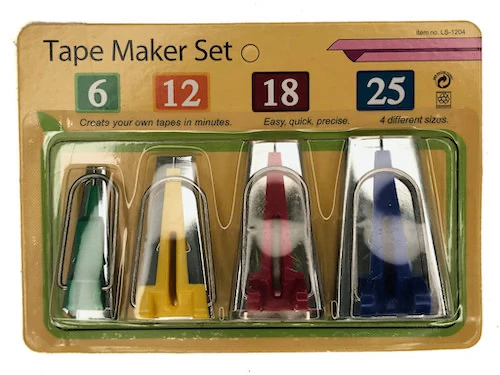 Set of bias tape makers.