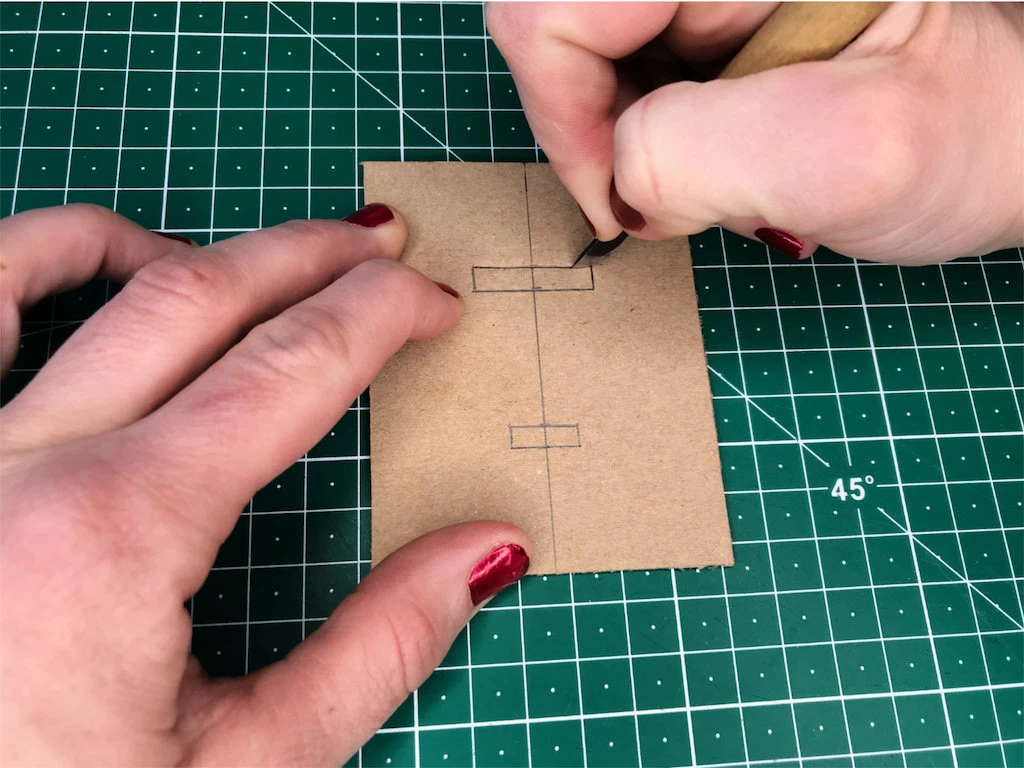 Cutting openings for the bias tape to go in and come out.