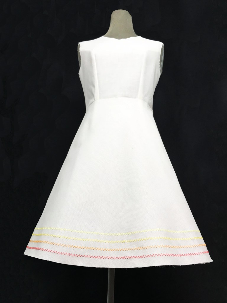 Decorative zig zag stitch on a half circle skirt.