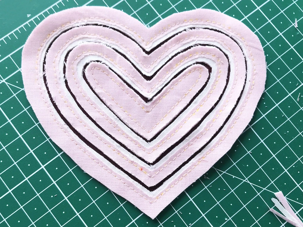 Thin stripes upper layer fabric are cut away.