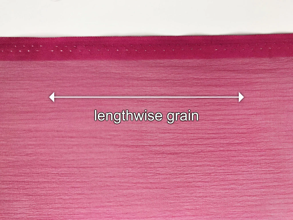 How to identify lengthwise grain using the selvedge line.