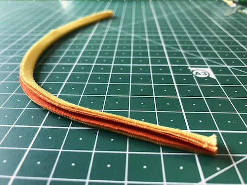 Ironed stripe of stacked fabric.