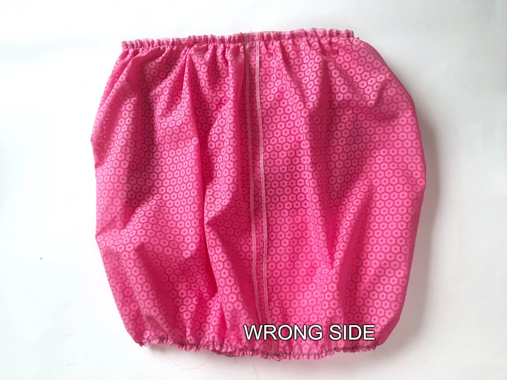 Easy bubble skirt design fabric gathered at waist and hem.