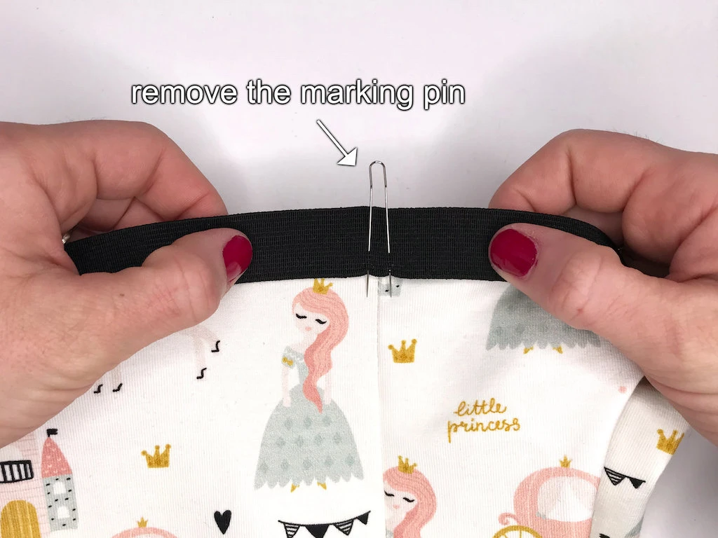 Pinned elastic waistband to leggings.