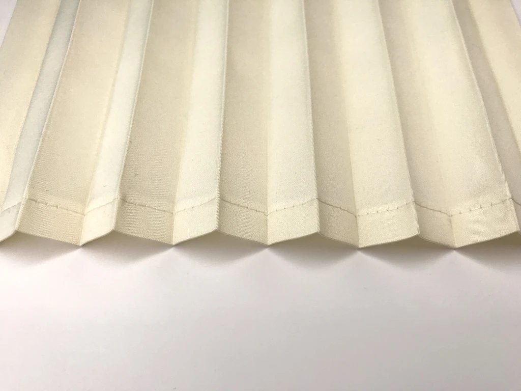 Single fold hem on satin fabric.