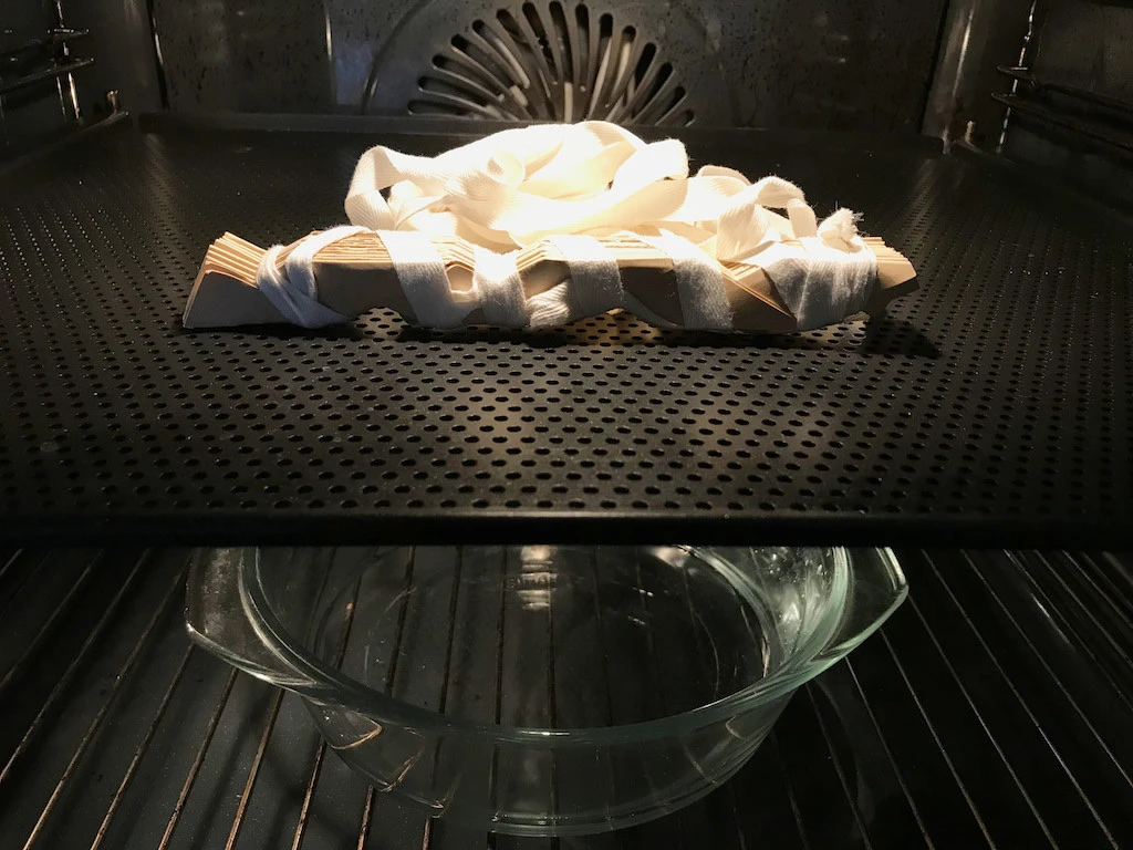 Steam the fabric in between pleating moulds. 5 minutes from each side.