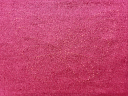 Traced butterfly template using a dressmakers tracing paper and tracing wheel.