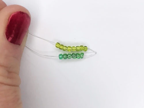 Light green and dark green beads of a leaf.