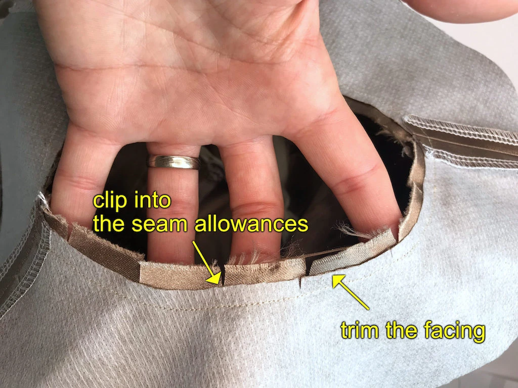 Facing sewn to the neckline right sides toghether.