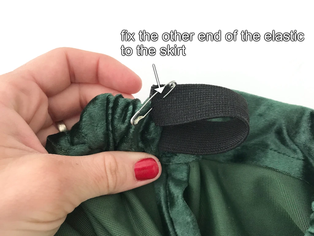 End of elastic waistband pinned to waistband casing.