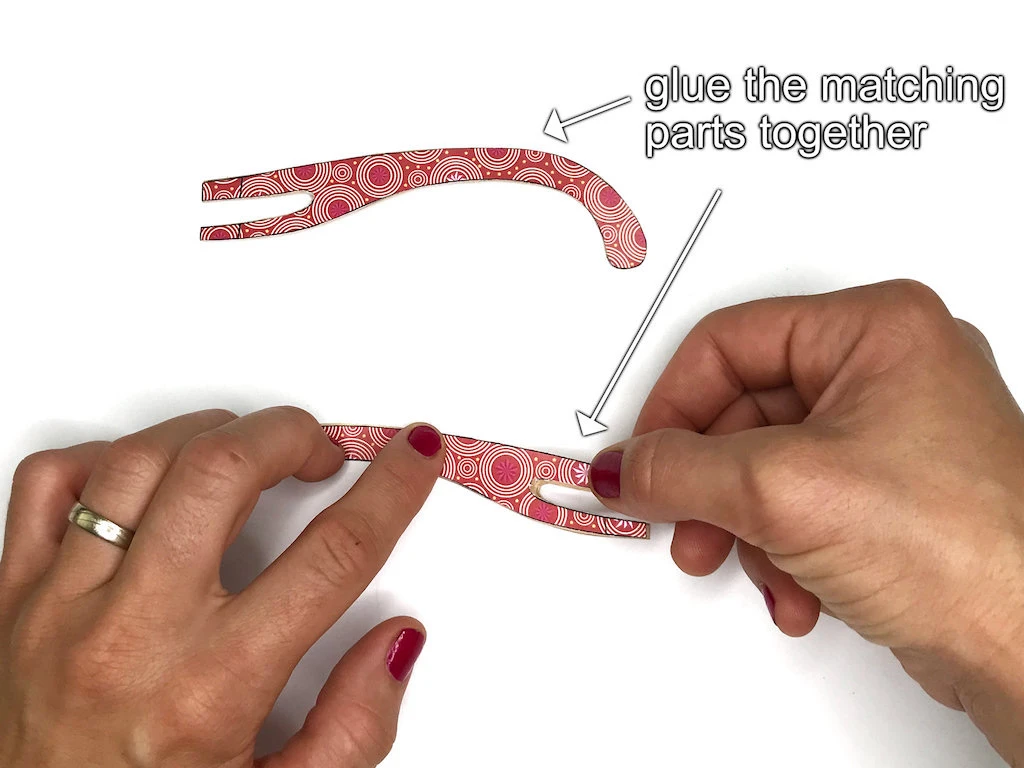 Assemble the cloured and kraft paper legs.