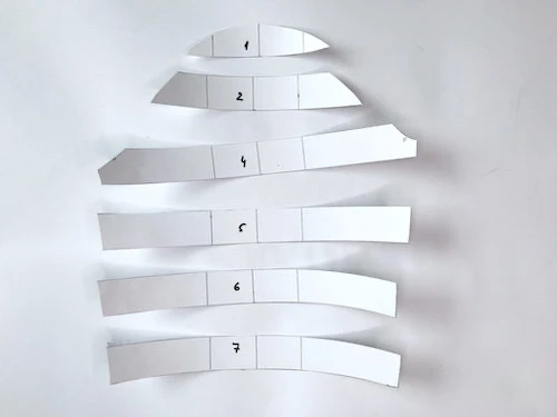 A set-in sleeve pattern slahsed into pieces.