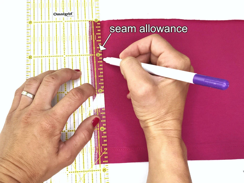 Marking seam allowance on fabric that is going to be pleated.