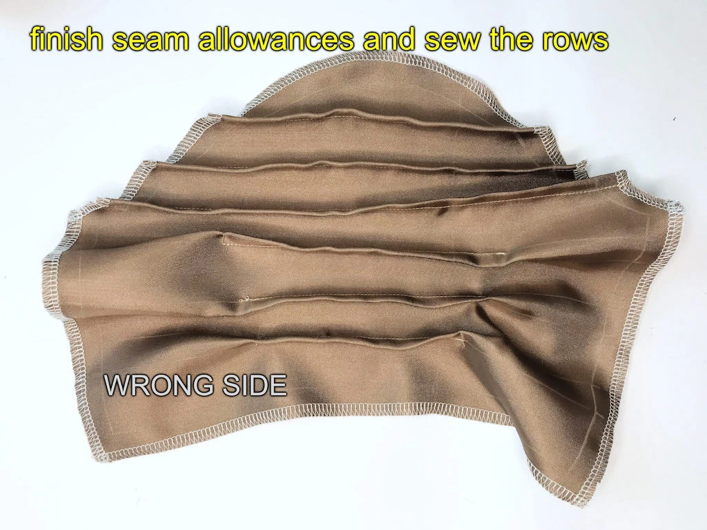 Narcissa Malfoy dress sleeve tucks on the wrong side.